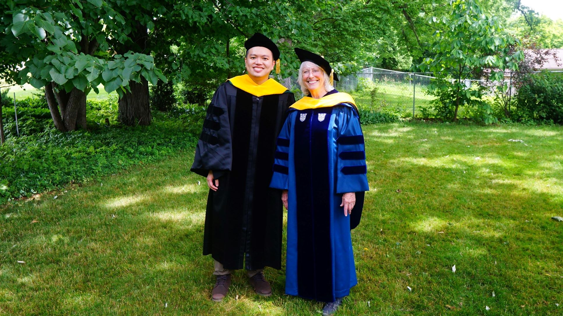 Yang-Tsung Lin and Barb Sears in graduation robes