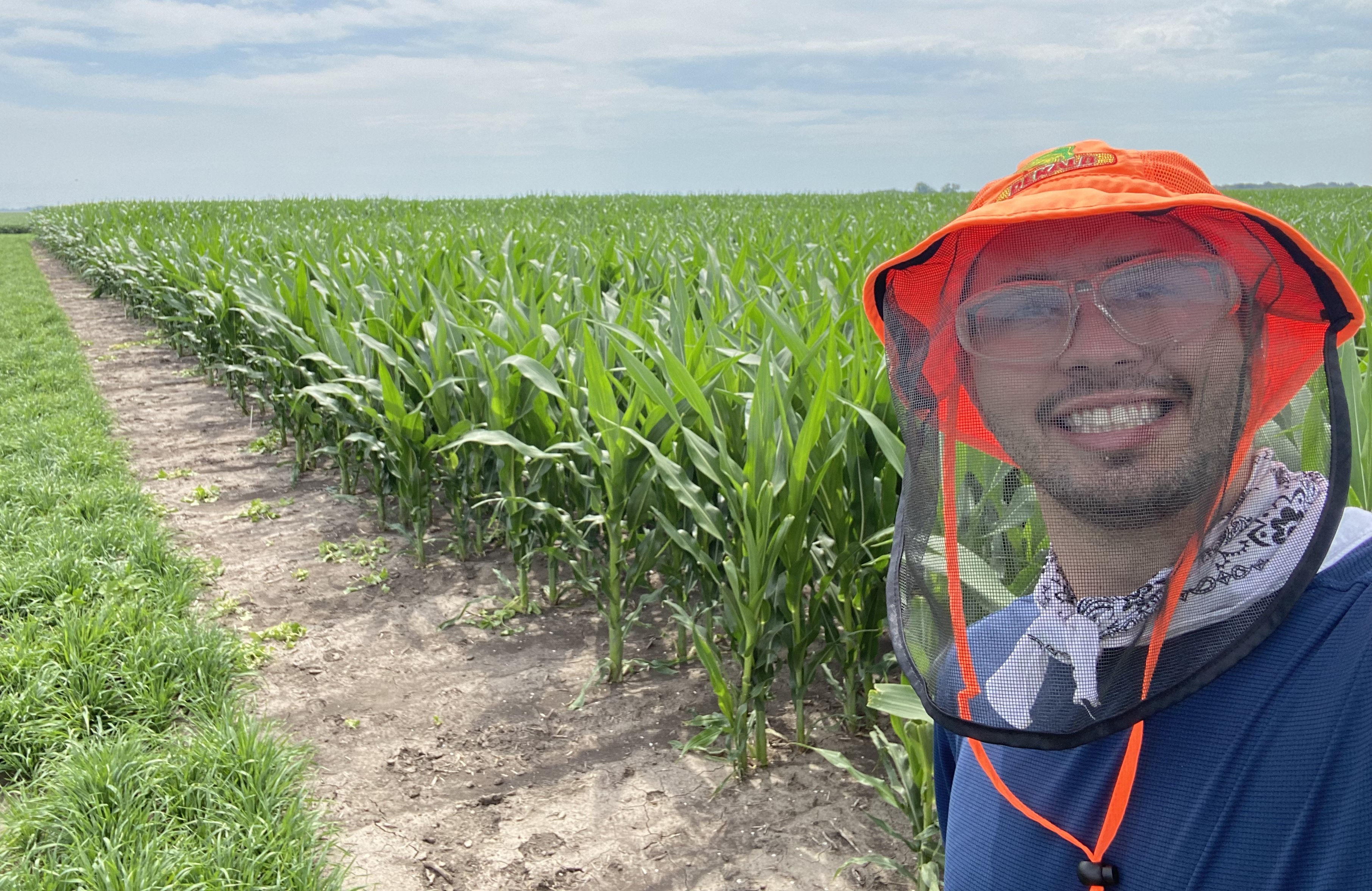 Luke Gregory in a corn field