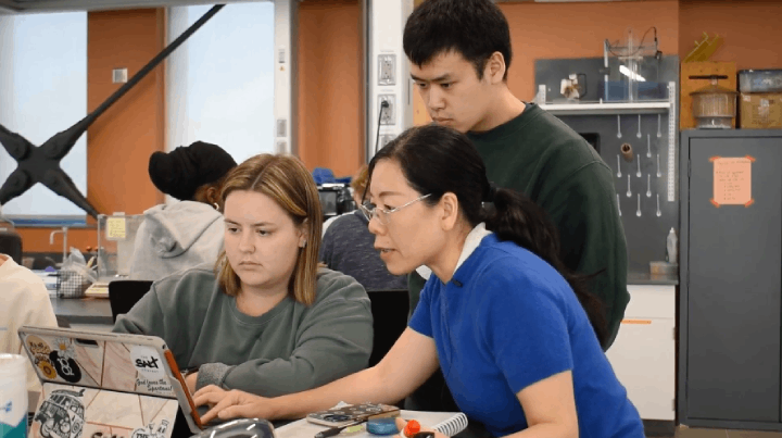 students in a lab setting classroom working on a project